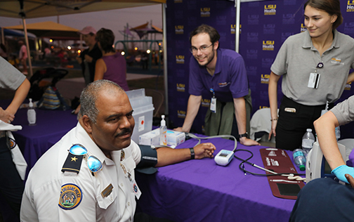 LSU Health nursing students taking blood pressure